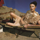 Image for article titled Marie Claire's "Outlaw" Look: $13,000 Gown & Black Lipstick
